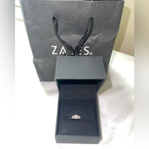 Zales ring size 7.5 nothing wrong with it. Perfectly new.